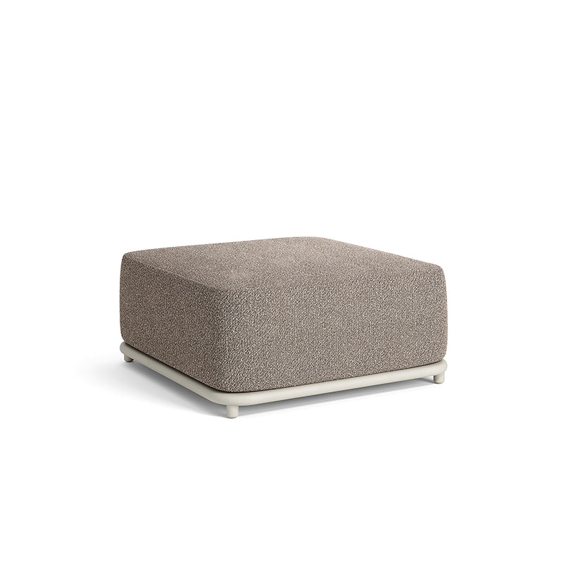 A modern, minimalist ottoman or footrest with a rectangular, upholstered gray cushion and a simple metal frame. The design is clean and contemporary, suitable for use in indoor or outdoor living spaces.